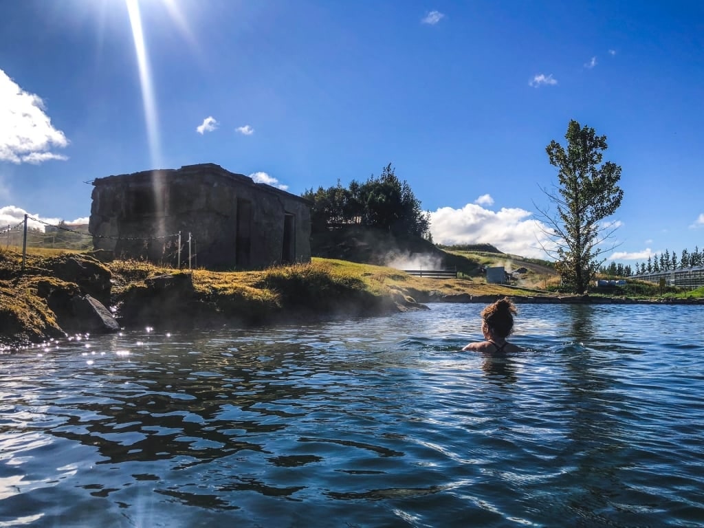 Woman swimming in The Secret Lagoon