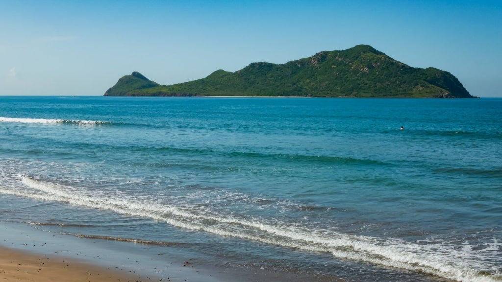 Calm waters of Deer Island with view of the mountains