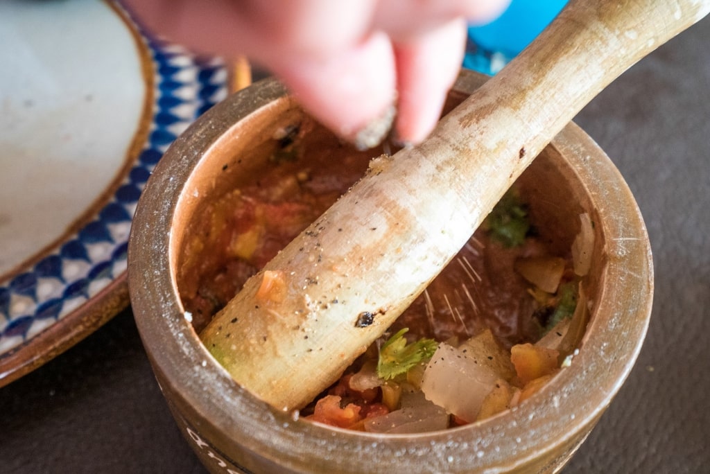 Man preparing salsa