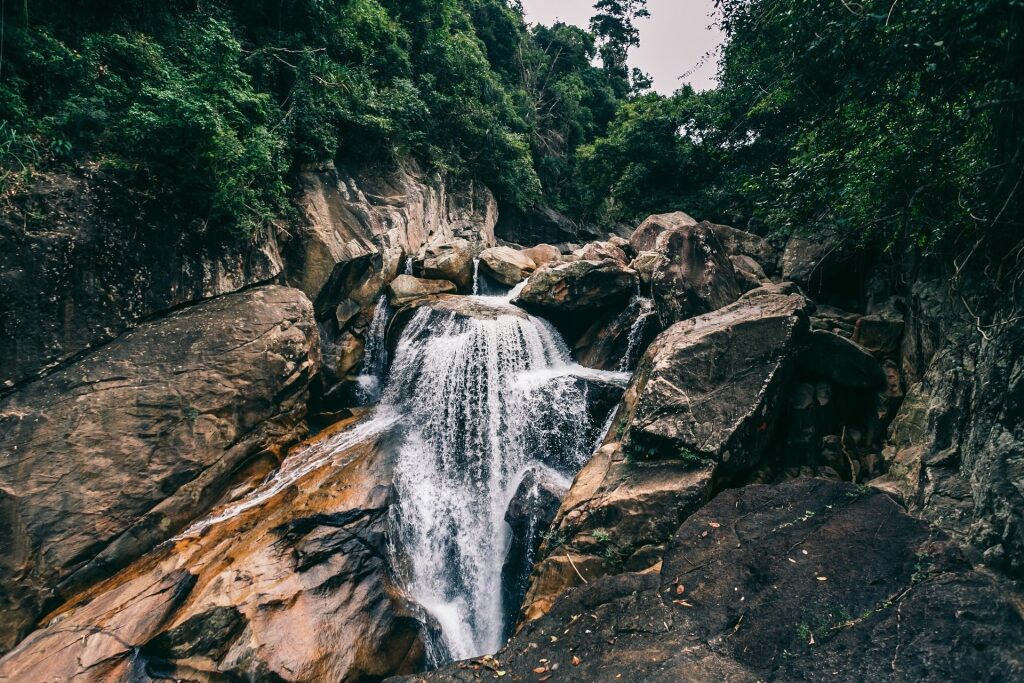 Huge rocks at the Ba Ho Waterfall