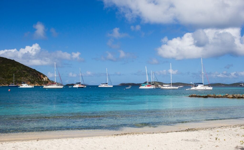 Sandy beach in St. John with boats