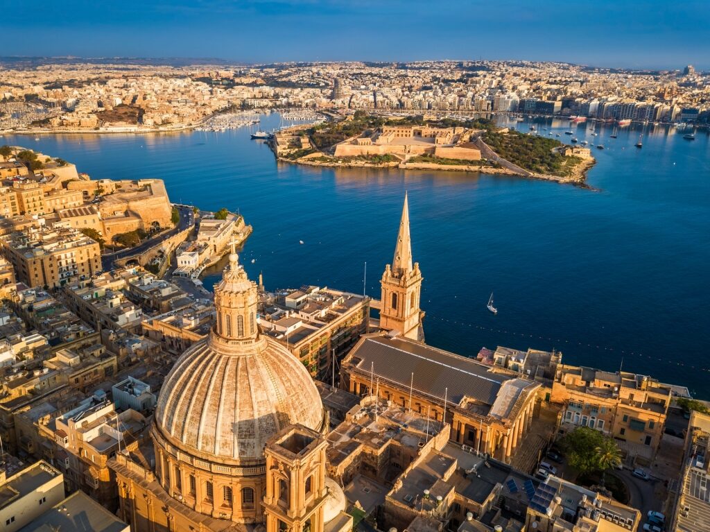 Aerial view of Valletta waterfront with deep blue water
