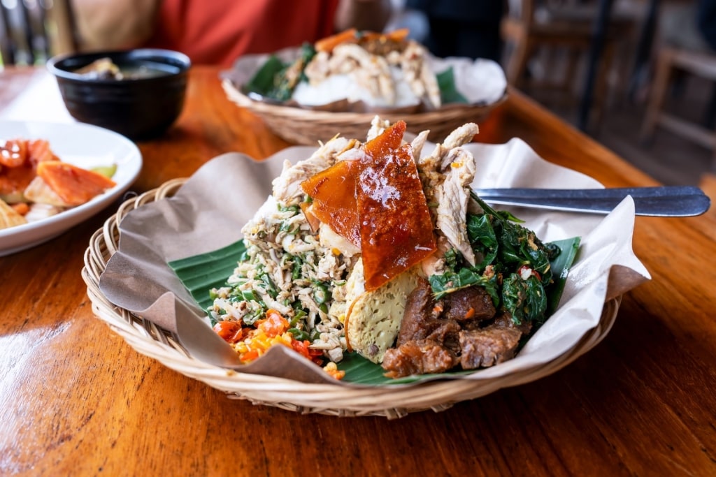 Savory babi guling on a plate at a restaurant in Bali