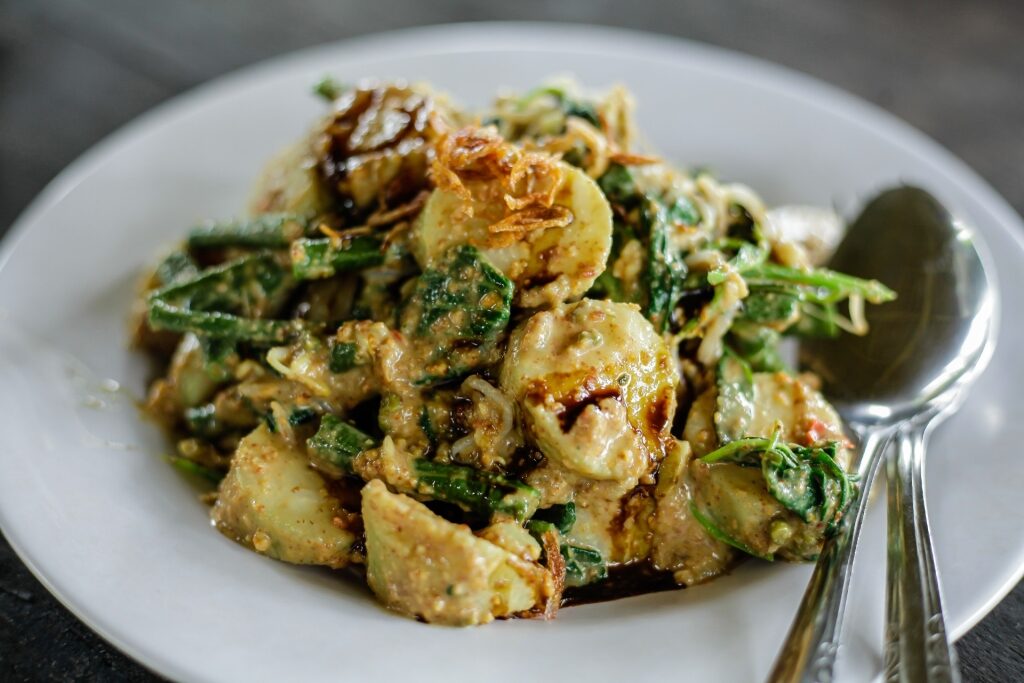 Plate of tipat cantok at a restaurant in Bali
