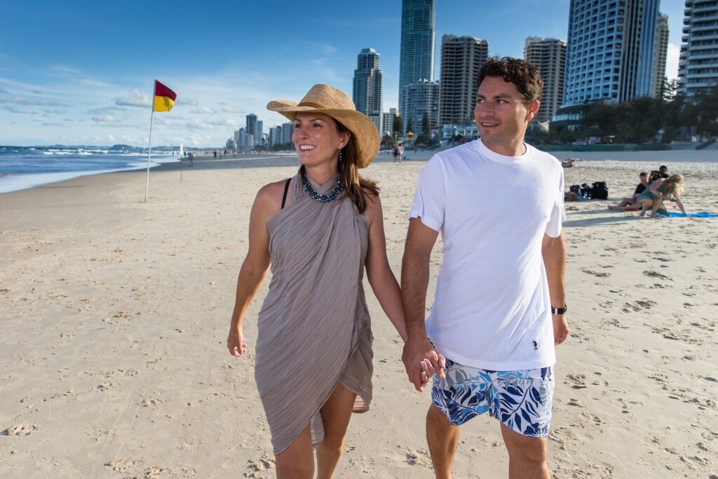 Couple walking along the Gold Coast