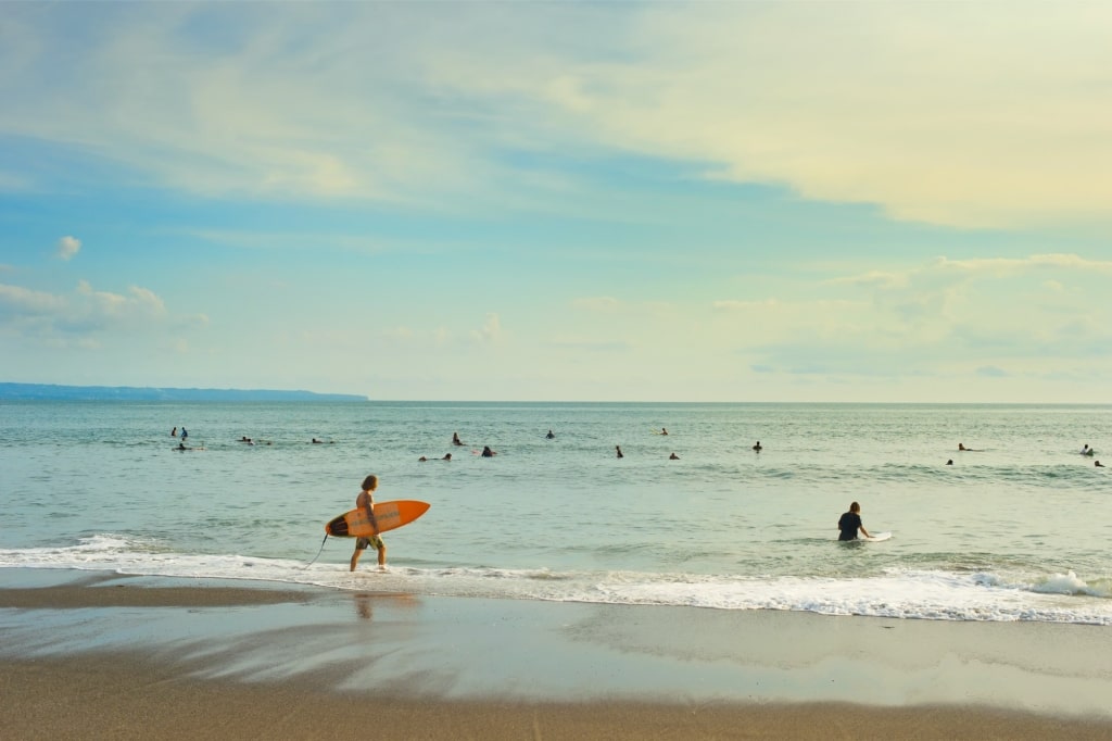 People enjoying the beach of Nelayan, Canggu