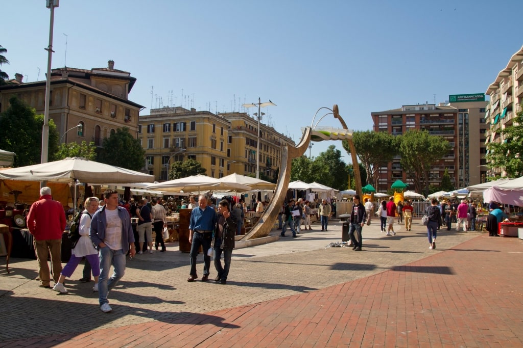 People strolling along the Porta Portese, Rome