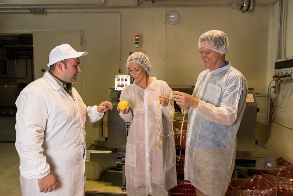 Couple on a tour in Villa Massa Limoncello Distillery