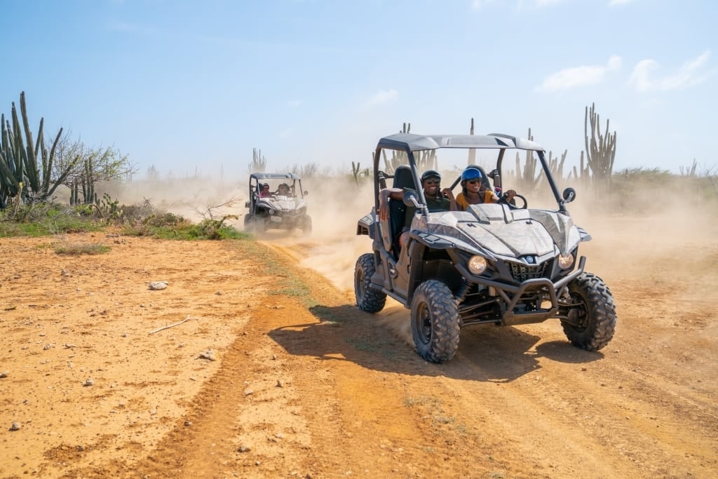 People enjoying a 4x4 ride in Aruba