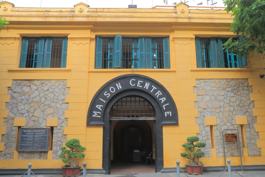 Yellow exterior of Hoa Lo Prison Museum