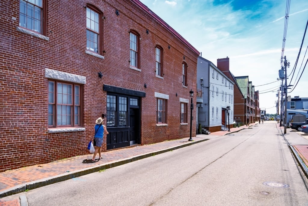 Woman browsing the stores in Old Port, Portland