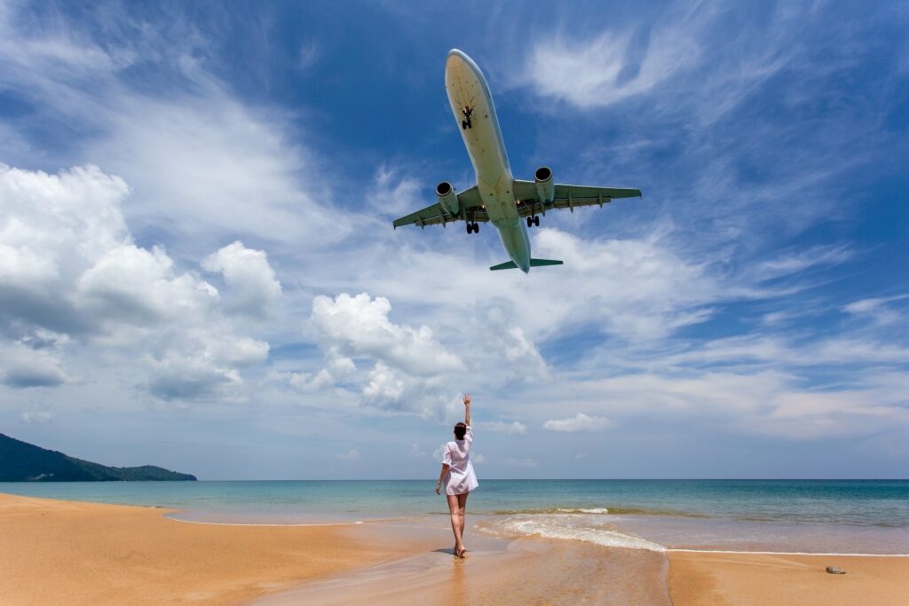 Airplane passing by Nai Yang Beach