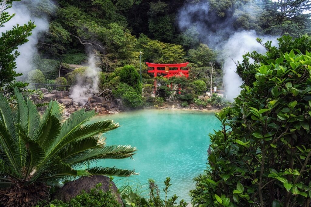 Landscape of Hells of Beppu, Japan with tori gate
