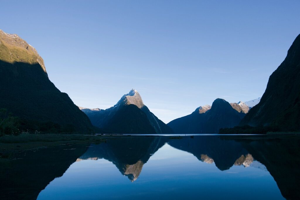 Beautiful view of Milford Sound reflecting on water