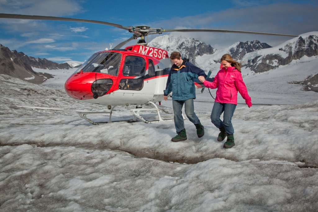 Couple walking on Mendenhall Glacier, Juneau