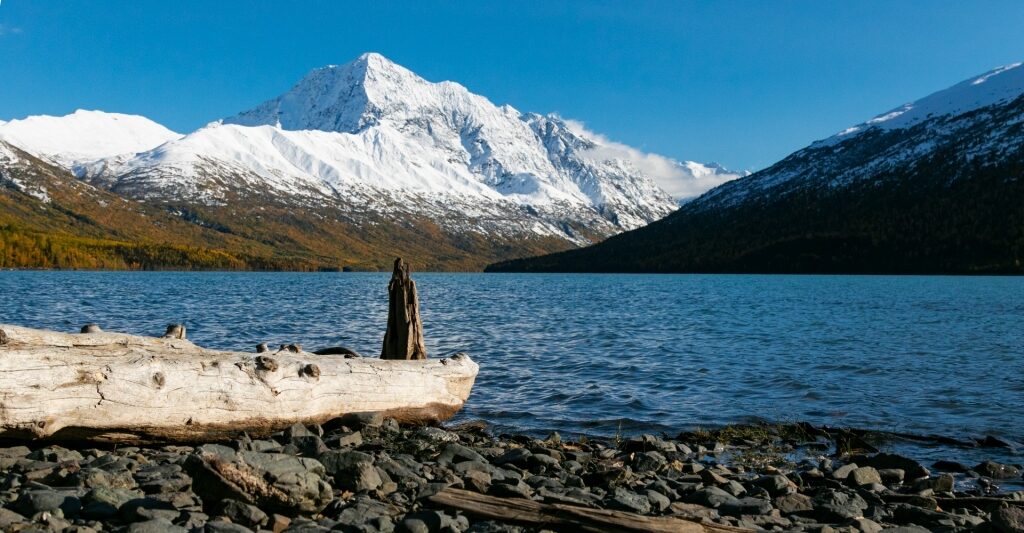 View of Eklutna Lake with snow-capped mountains
