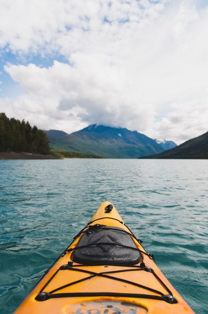 Person kayaking in Eklutna Lake, Anchorage