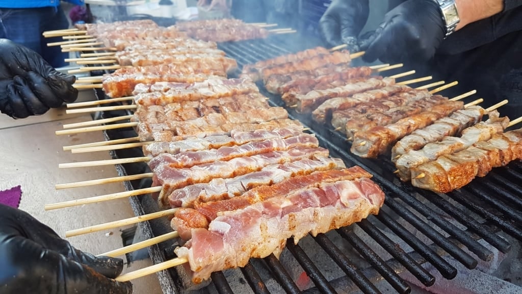 Chicken souvlaki on a grill