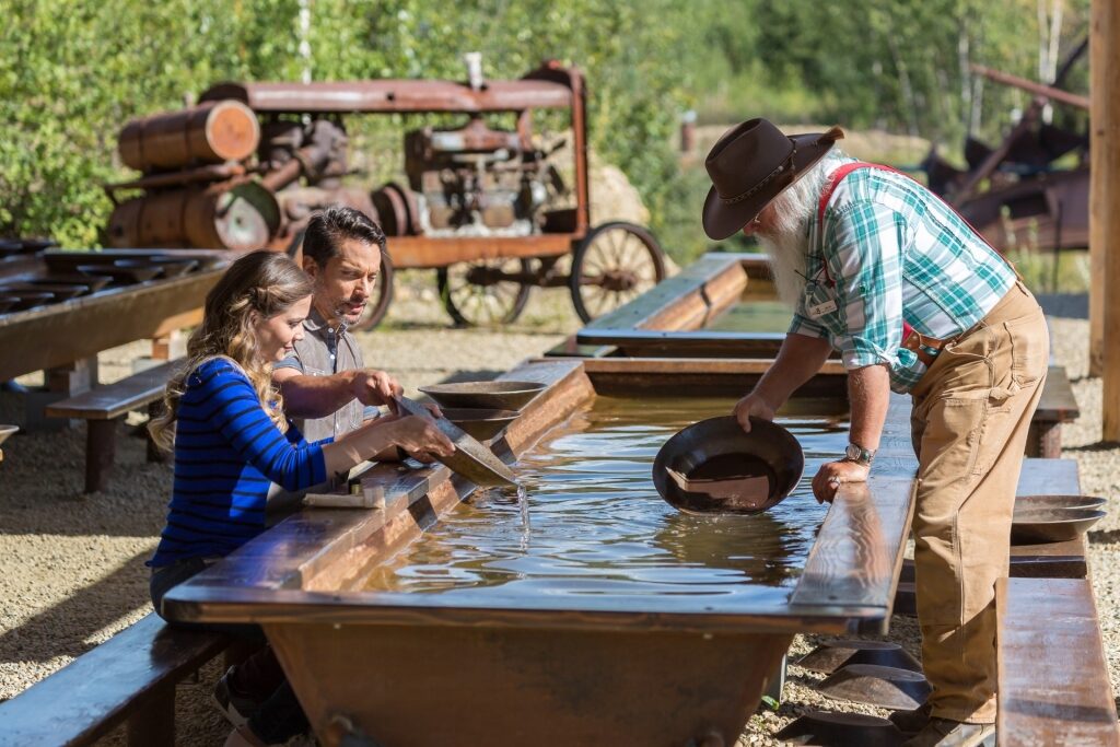 Couple gold panning at the Gold Dredge 8, near Fairbanks