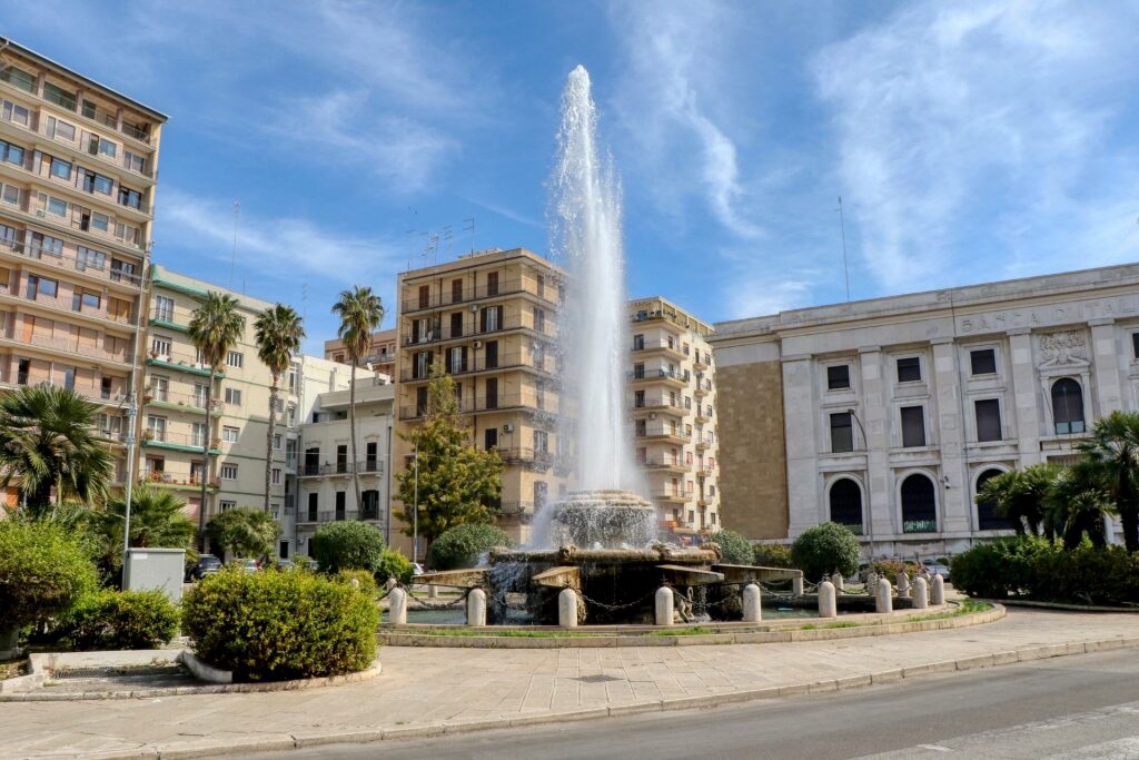 Street view of Piazza Ebalia with iconic fountain