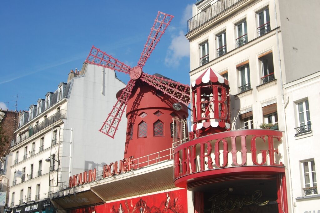 Outside the Moulin Rouge with iconic red windmill