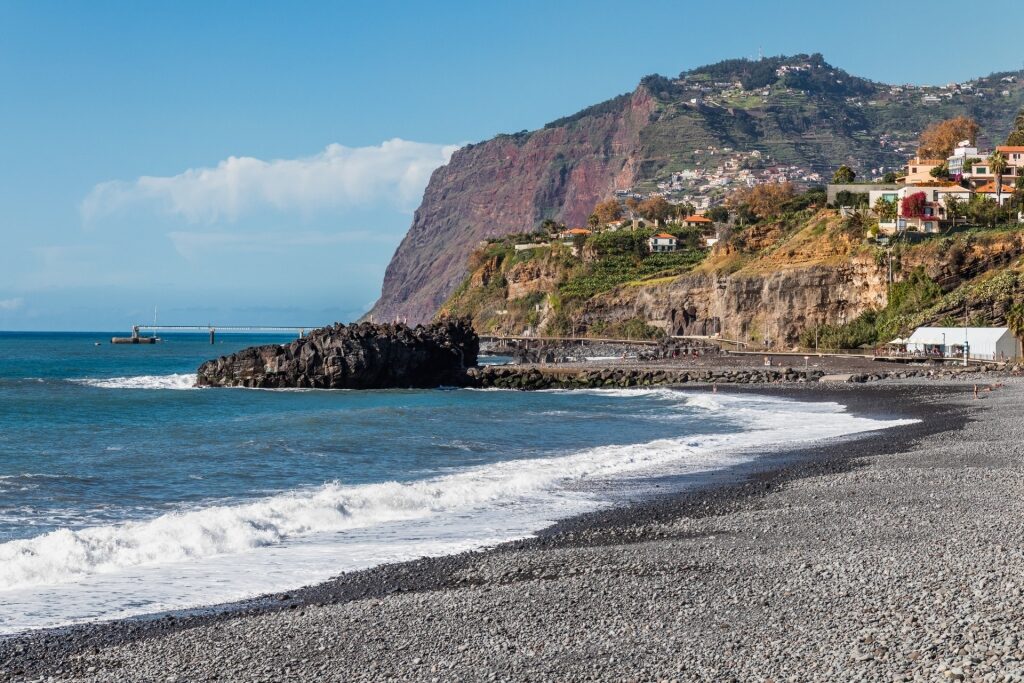 Black sands of Praia Formosa in Madeira, Portugal