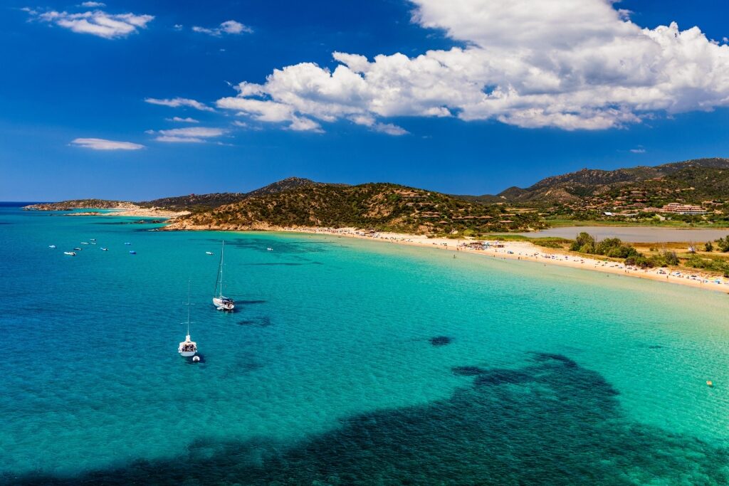 Clear waters of Spiaggia di Sa Colonia in Sardinia, Italy