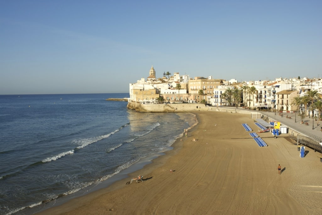 Brown sands of San Sebastian Beach, Sitges