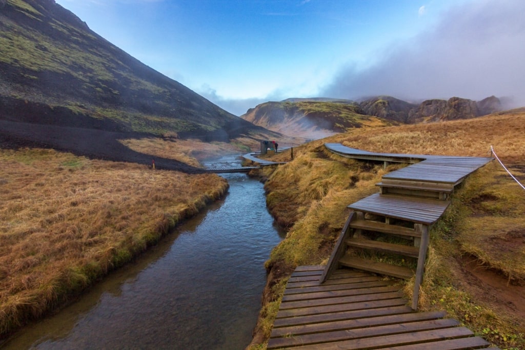 Boardwalk in Reykjadalur Steam Valley with steaming water