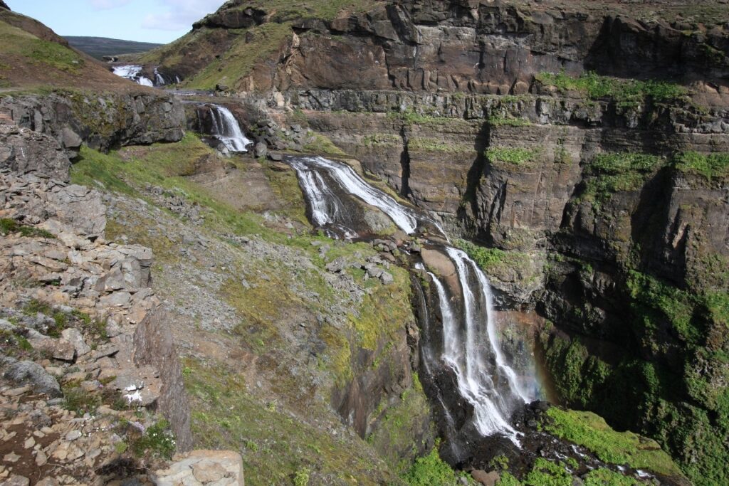 View of Glymur Waterfall from a hiking trail