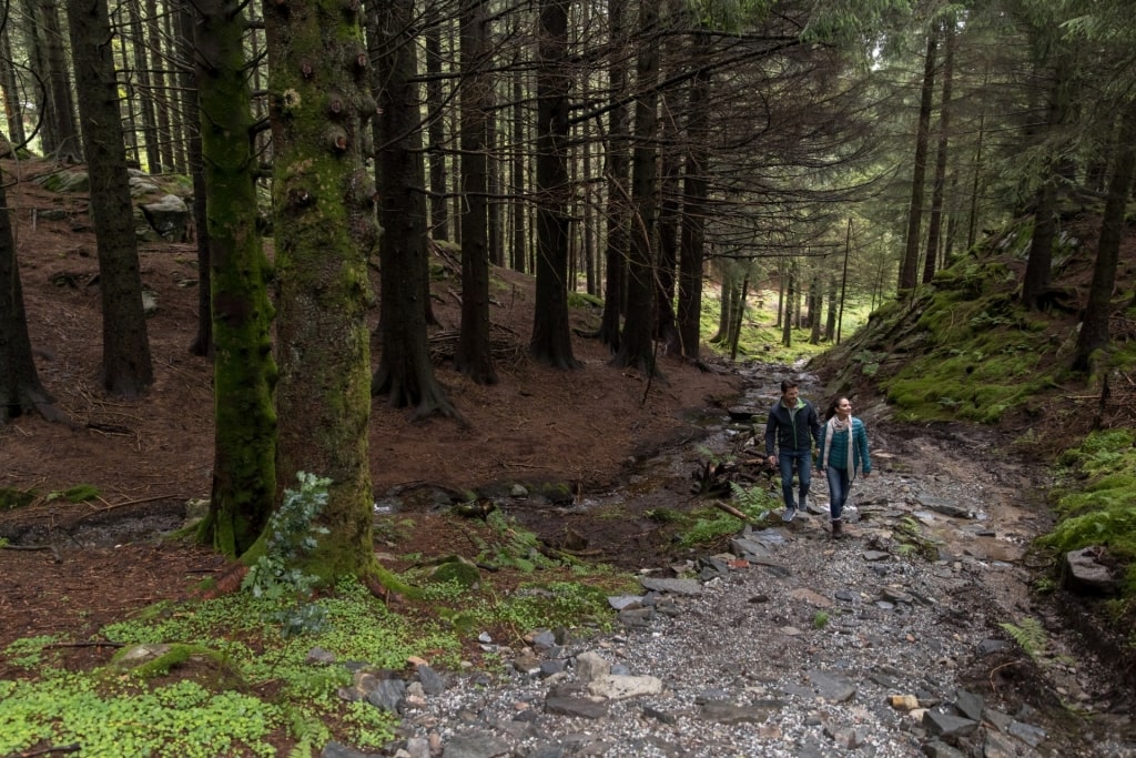 Couple hiking the Floyen Mountain in Bergen, Norway