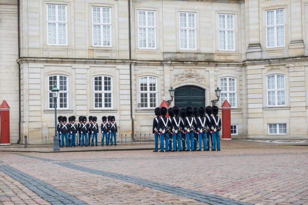 Beautiful Amalienborg Palace in Copenhagen with guards
