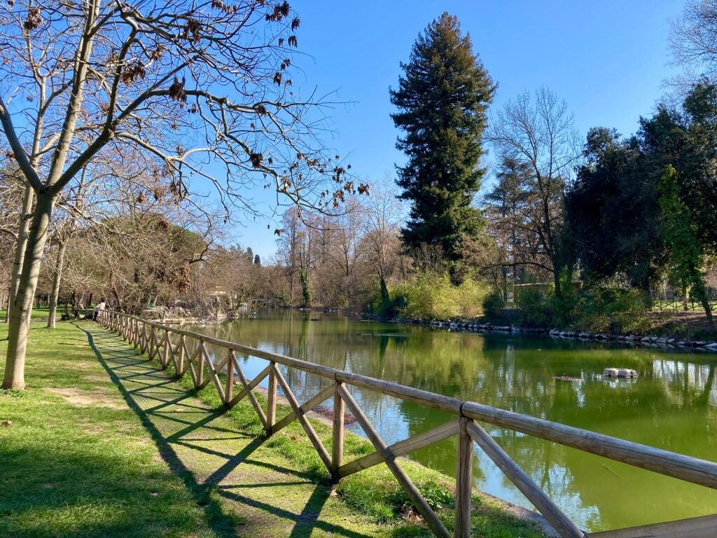 Pathway in Giardini Margherita, Bologna with view of the water