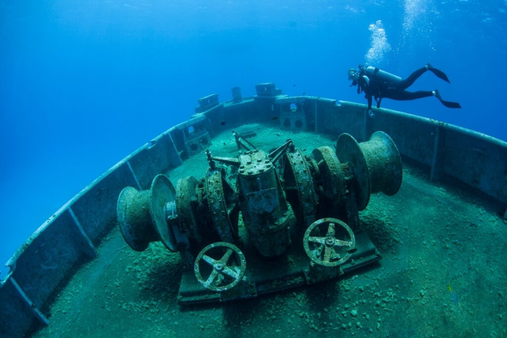 Man scuba diving in USS Kittiwake
