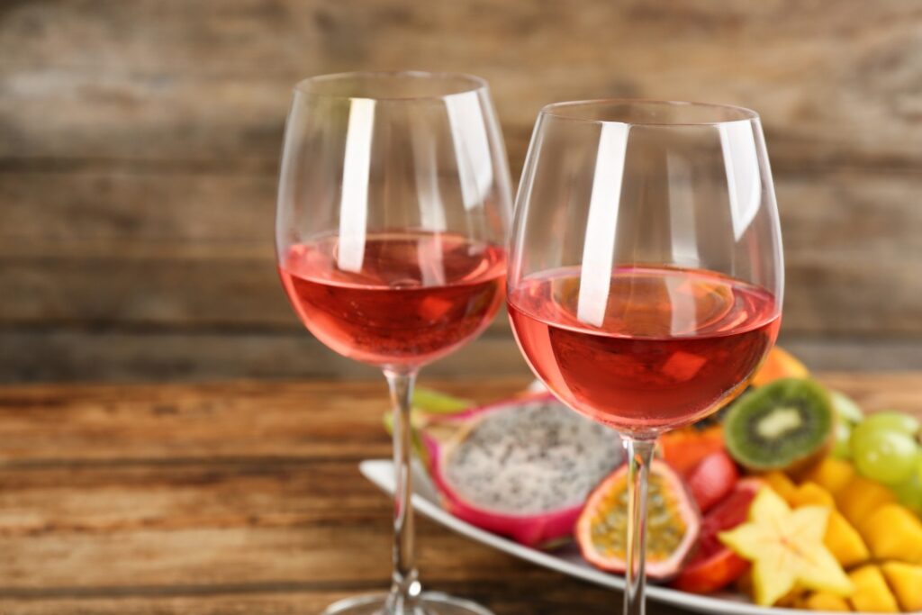 Glasses of fruit wine on a table