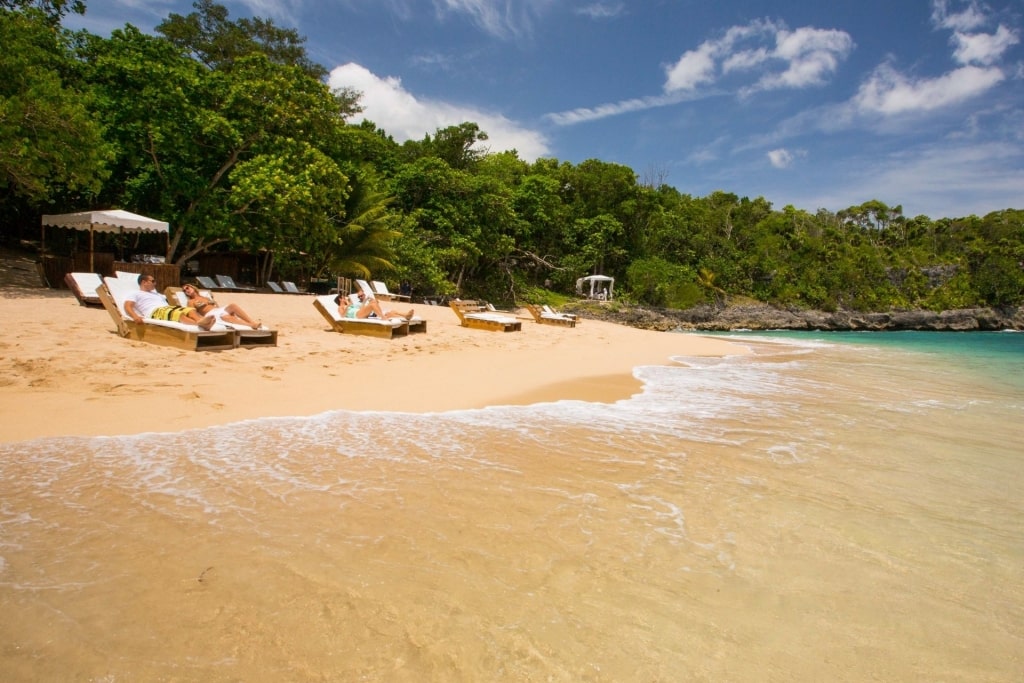 People relaxing on the shores of Bamboo Beach Club