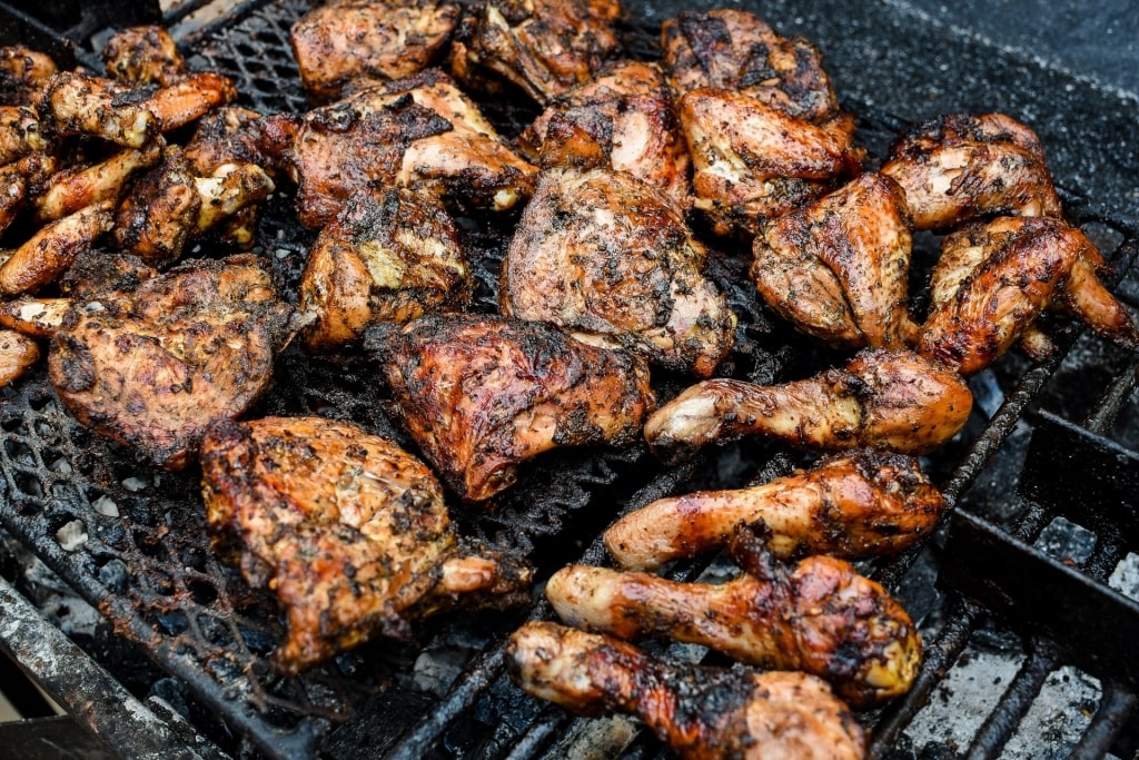 Jamaican jerk chicken on a grill