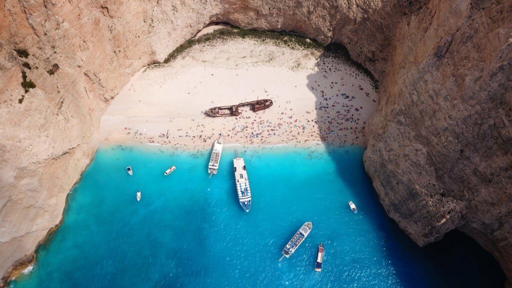 Birds eye view of Navagio/Shipwreck Beach with boats