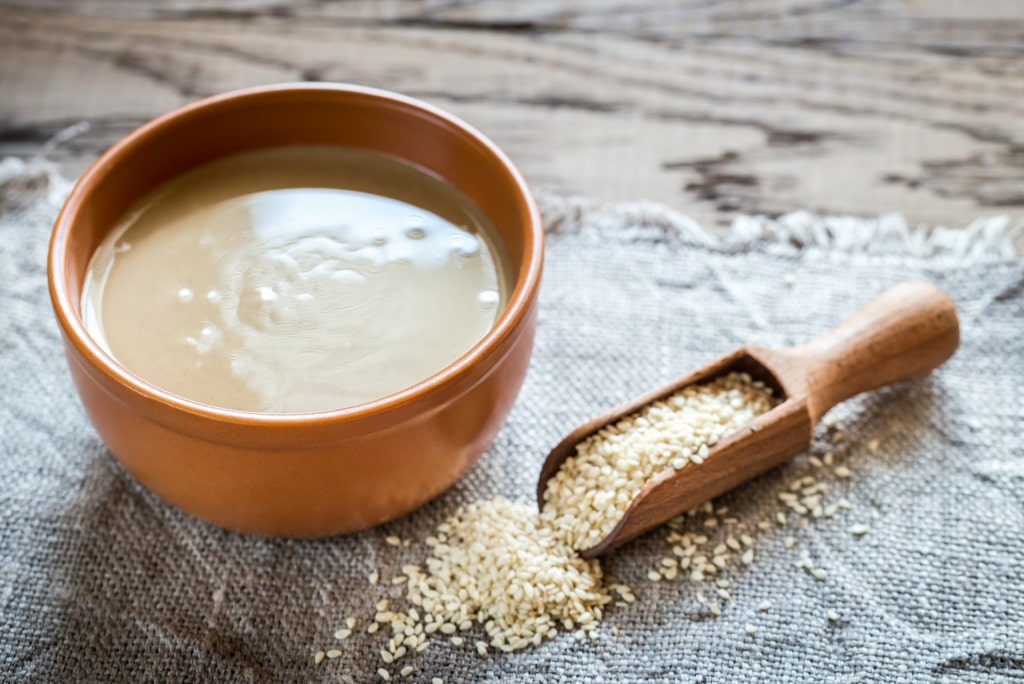 Small bowl of tahini with sesame seeds