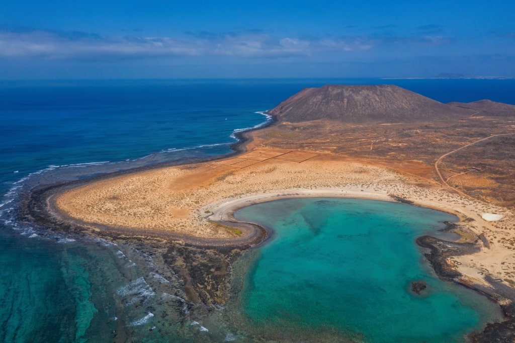 Aerial view of the remote La Concha Beach, Lobos Islet Natural Park