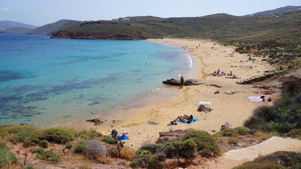 People relaxing at Agios Sostis Beach, Mykonos