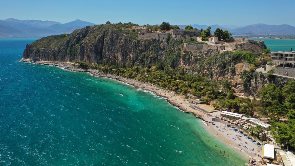 Cliffs towering over Arvanitia Beach, Nafplio