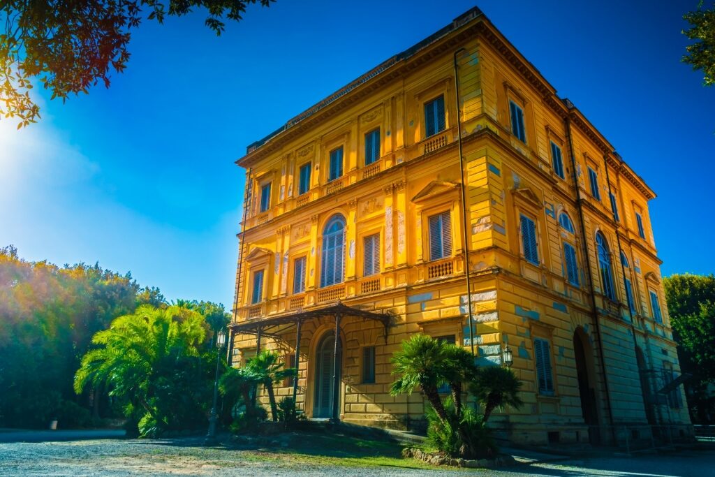 Yellow exterior of Museo Civico Giovanni Fattori