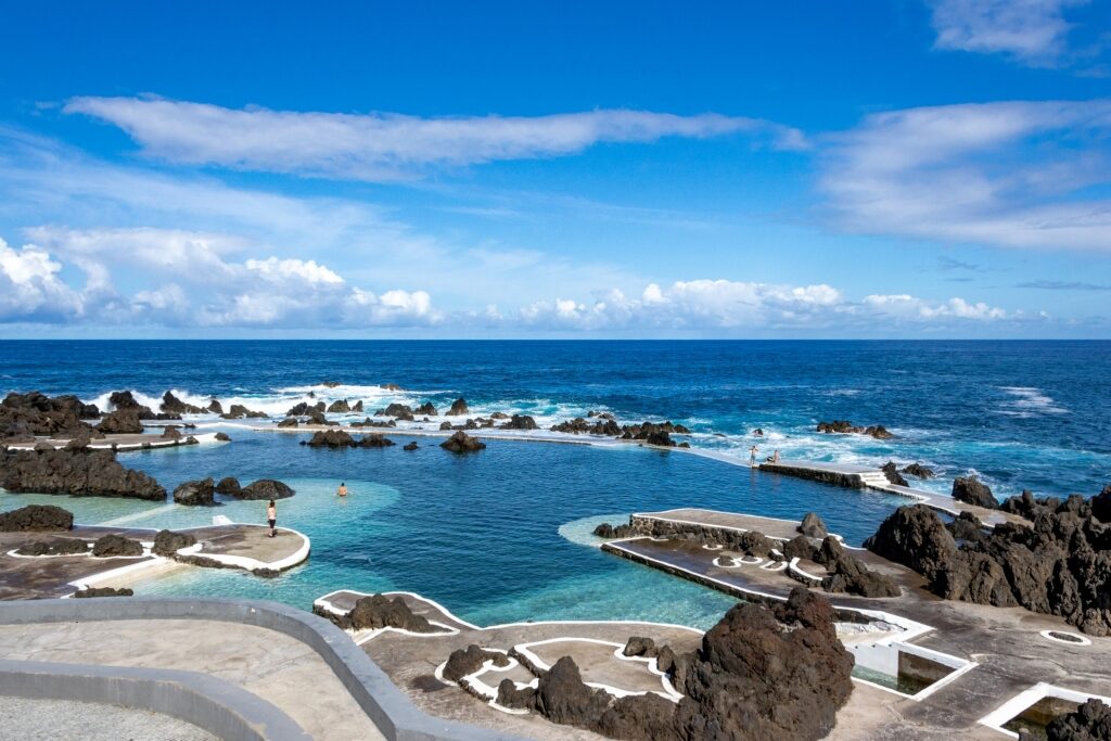 Different shades of blue of the water of Porto Moniz Bathing Pools