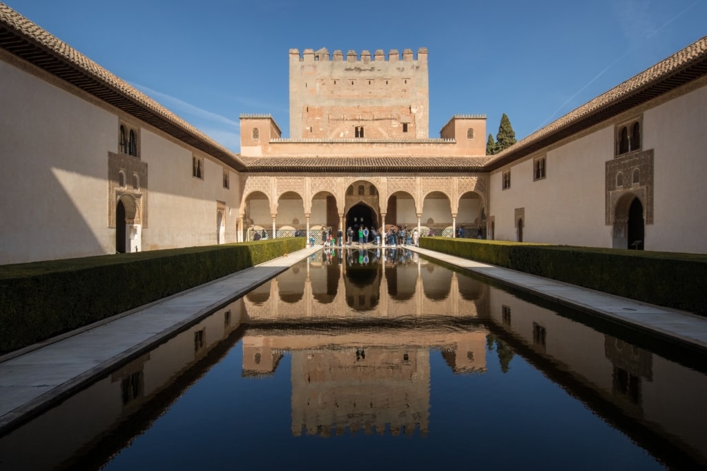 Patio de la Alberca reflecting on water