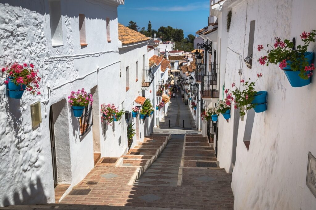 Street view of whitewashed town of Mijas