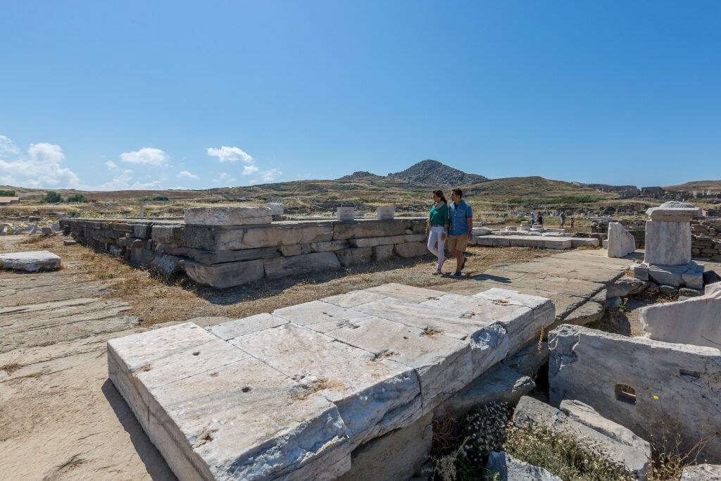 Couple exploring the historic island of Delos