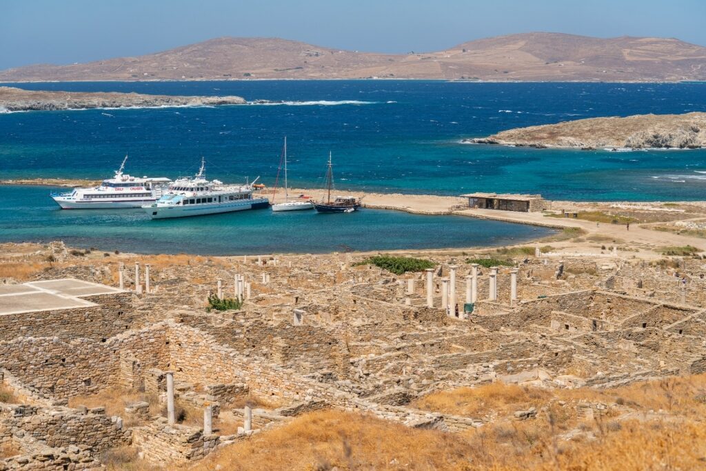 Ancient Greek ruins in Delos with view of the water
