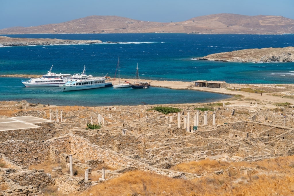 Ancient Greek ruins in Delos with view of the water