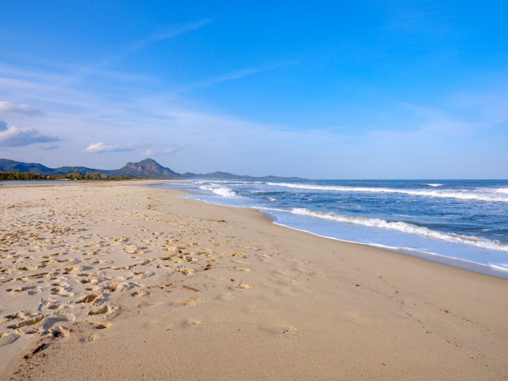 Sandy beach of Piscinas Beach